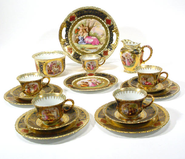 Appraisal: Vienna porcelain part teaset printed with panels of lovers comprising