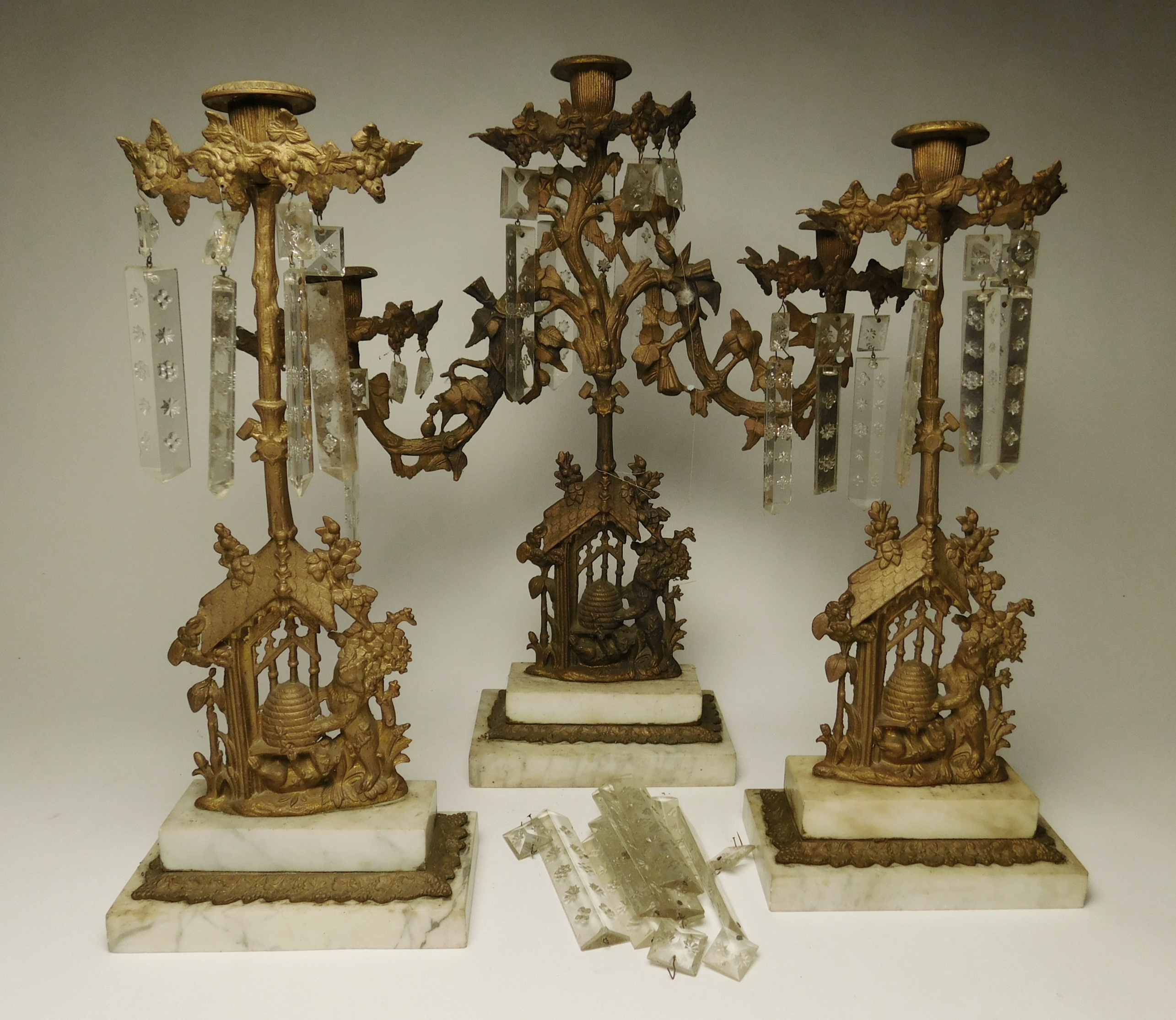 Appraisal: -piece Bear and Beehive girandole set attributed to Cornelius Co