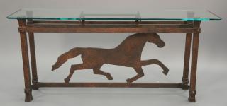 Appraisal: Iron base table with horse having glass top ht in