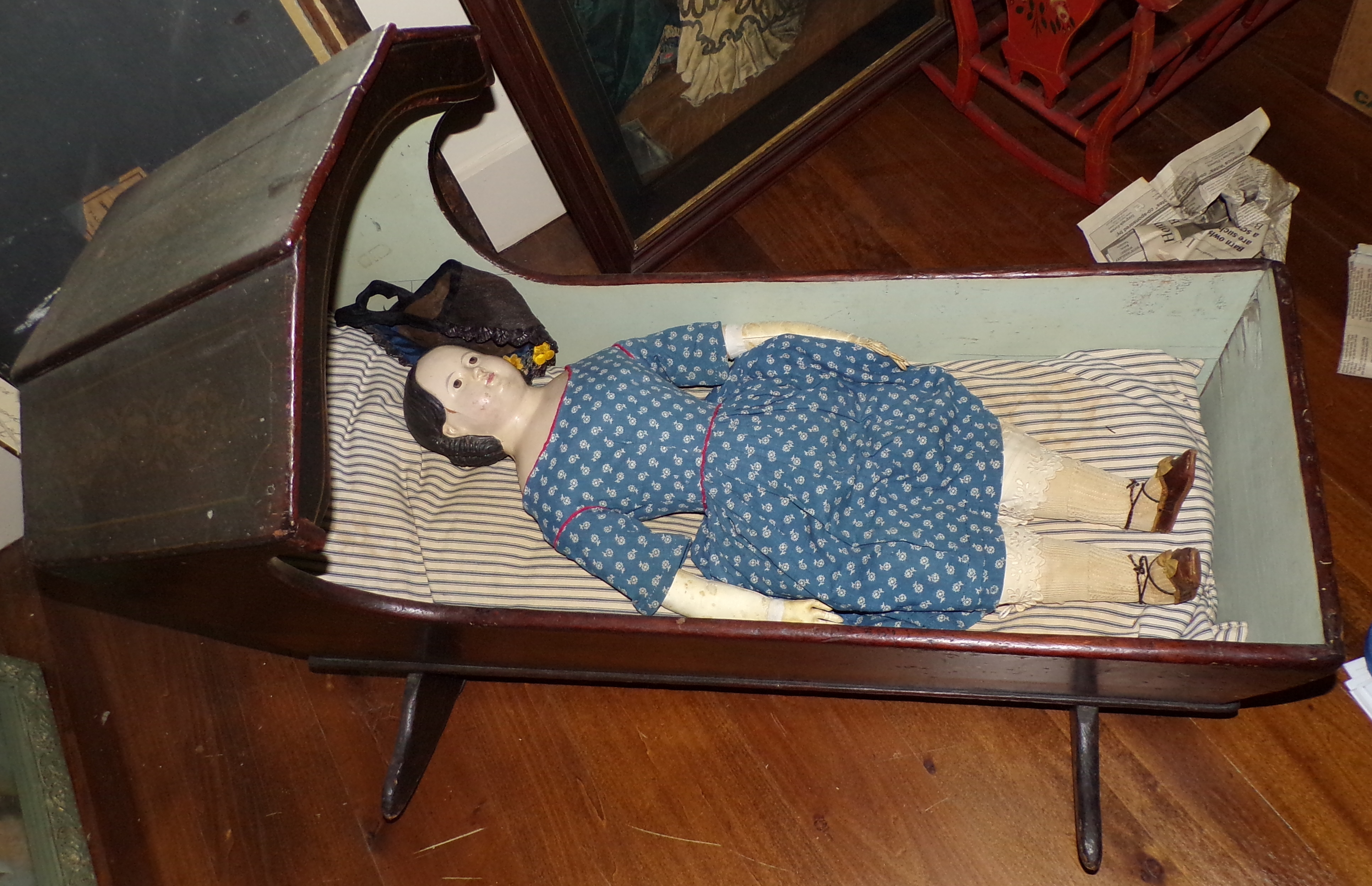 Appraisal: Doll and cradle doll composition head with cloth body in