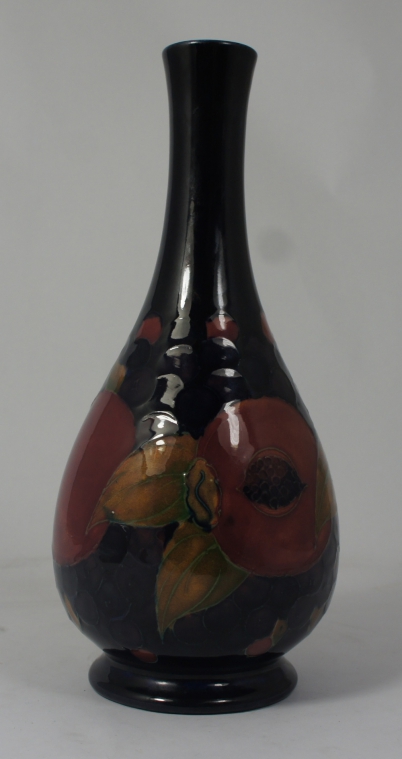 Appraisal: Moorcroft vase decorated with pomegranates height cm