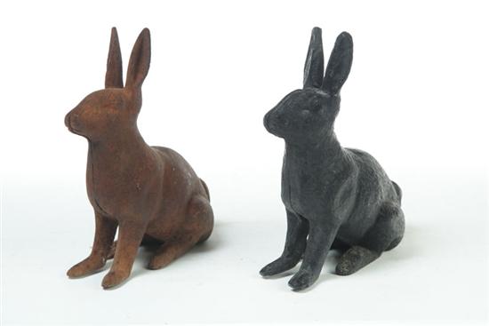 Appraisal: TWO CAST IRON DOORSTOPS American early th century Seated rabbits