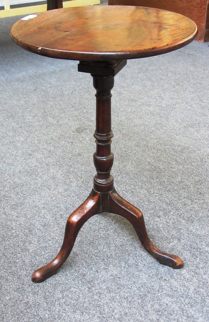 Appraisal: A th century mahogany circular snap top occasional table with