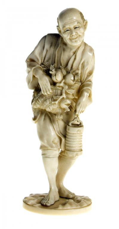 Appraisal: AN IVORY OKIMONO of a vegetable seller with a straw