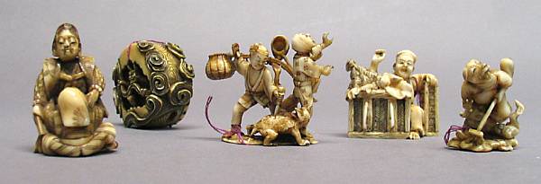 Appraisal: A group of five ivory and marine ivory figural netsuke