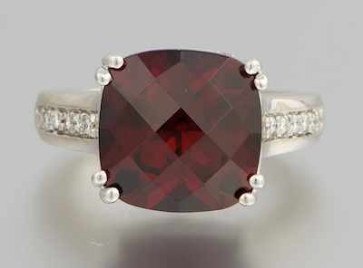 Appraisal: A Ladies' Garnet and Diamond Ring k white gold ring