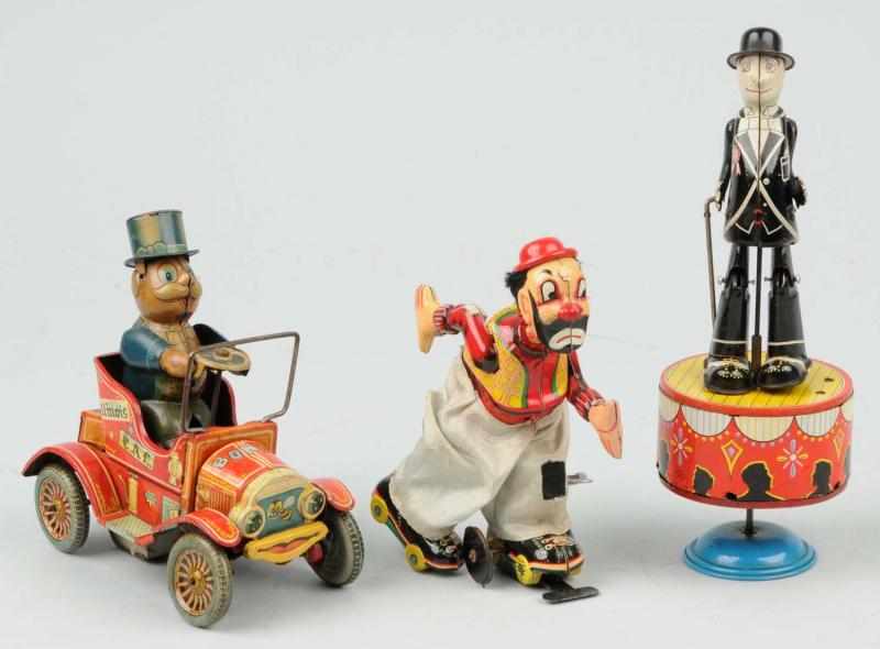 Appraisal: Lot of Tin Toys Description Japanese Includes one TPS Clown