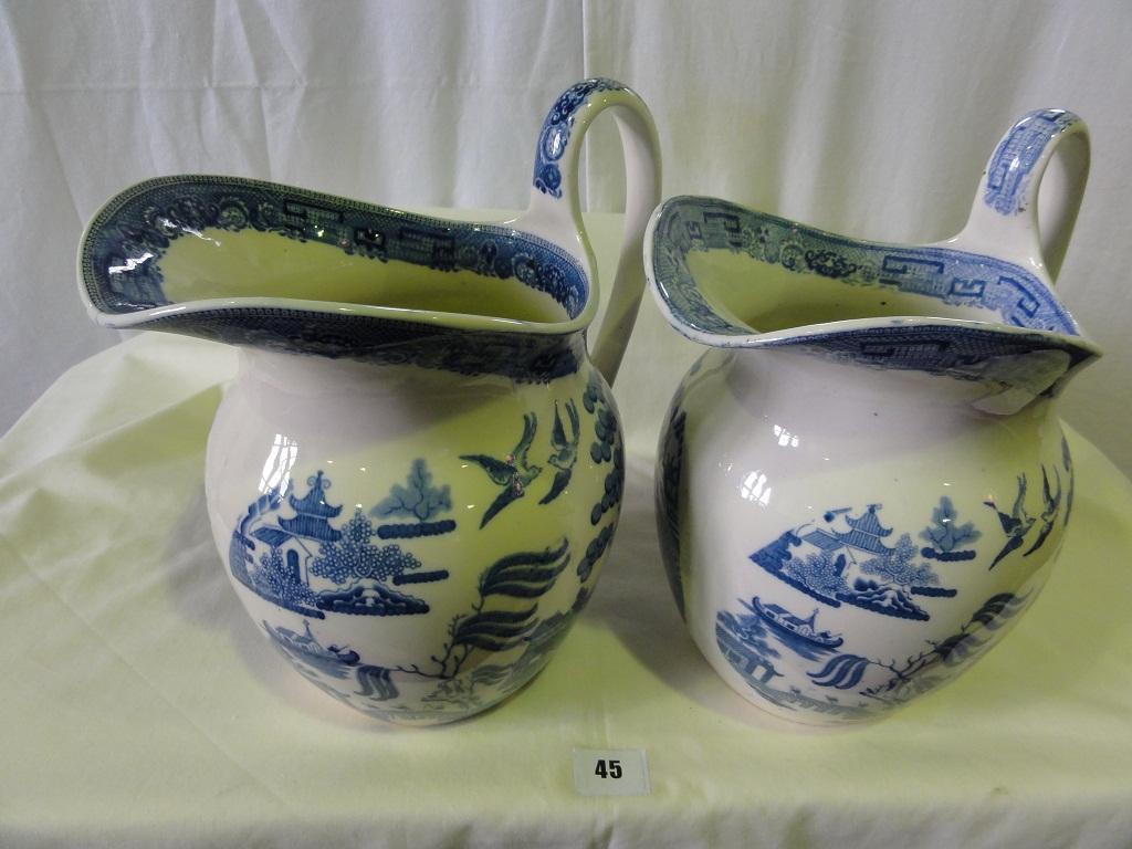 Appraisal: A pair of th century Wedgwood ewers with blue and