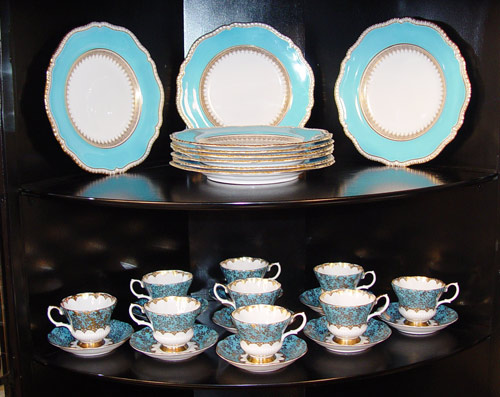 Appraisal: COPELAND SERVICE PLATES AND ROYAL ALBERT CUPS AND SAUCERS Copeland