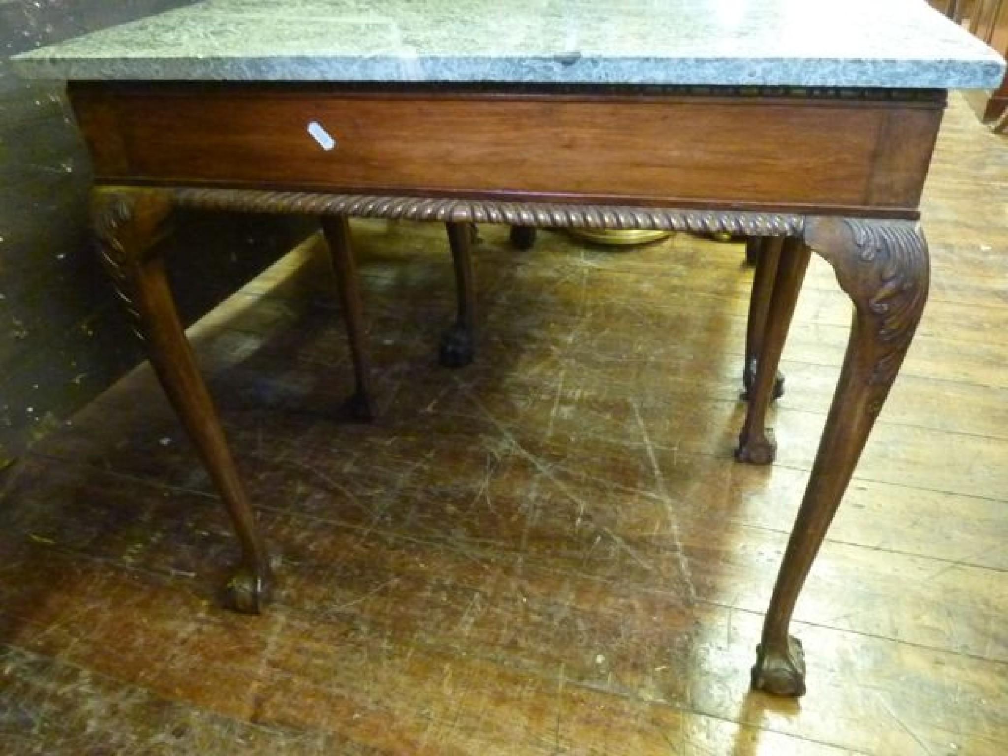 Appraisal: A Georgian style mahogany occasional table of rectangular form with