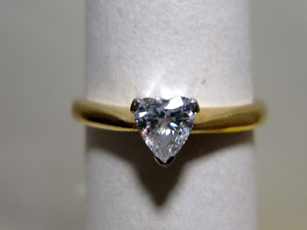 Appraisal: Eighteen carat gold heart shaped diamond solitaire ring