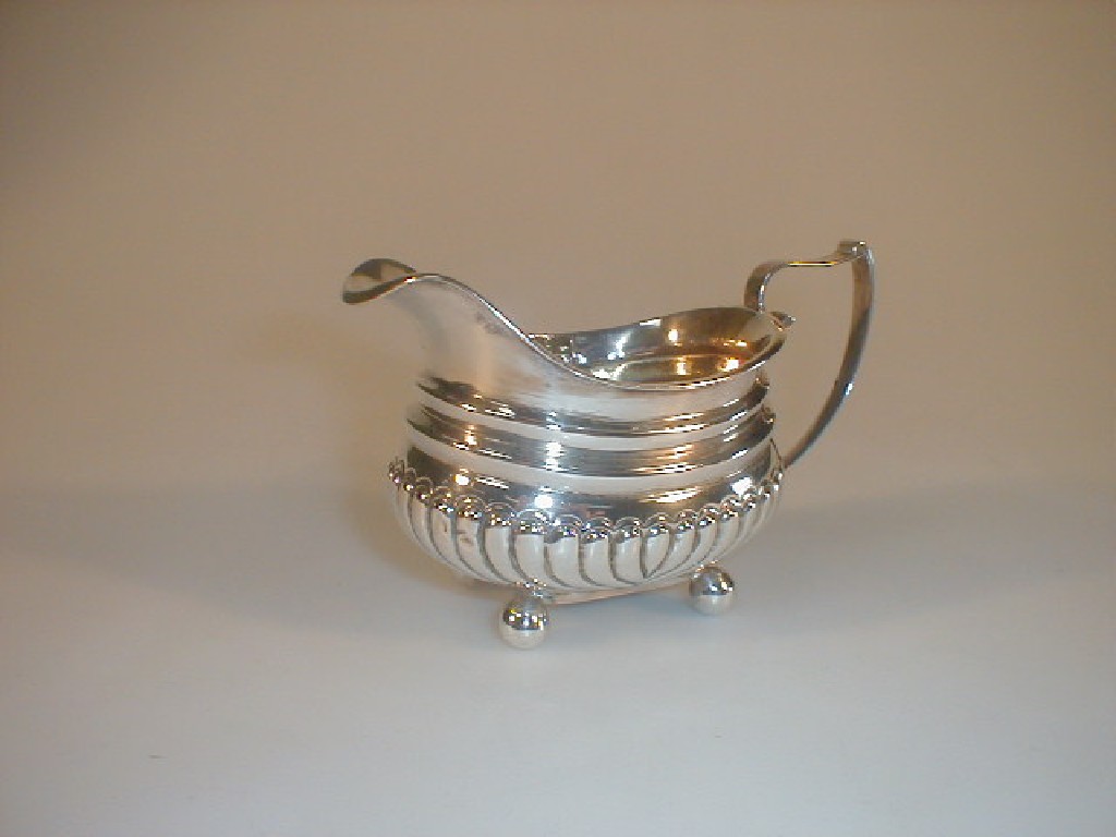 Appraisal: A George III silver cream jug -