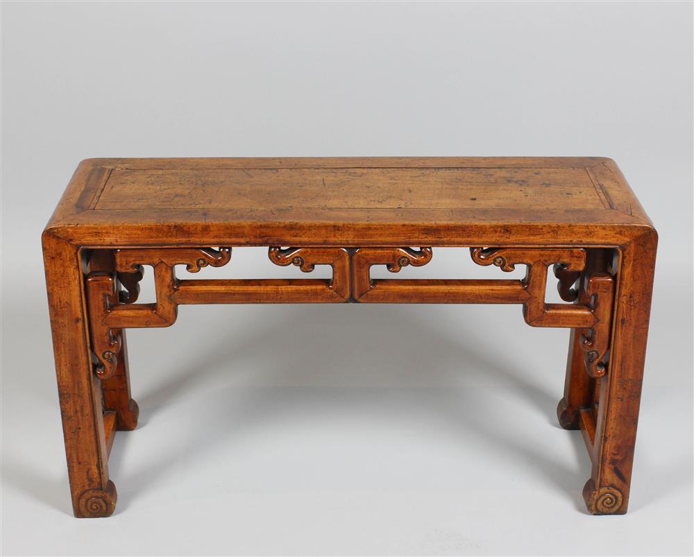 Appraisal: CHINESE SOFTWOOD LOW TABLE the rectangular top above rectangular panels