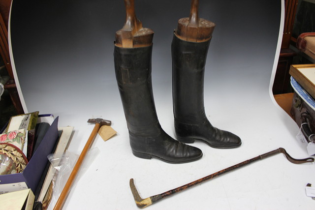 Appraisal: A PAIR OF LATE TH CENTURY BLACK LEATHER RIDING BOOTS