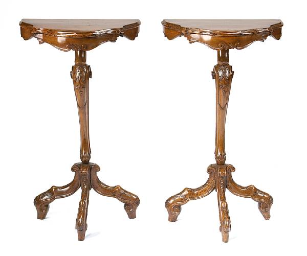 Appraisal: A pair of Italian Rococo walnut gu ridons trespolo late