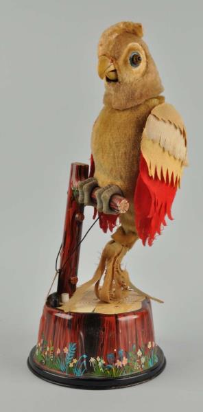 Appraisal: Japanese Marx Battery - Operated Talking Parrot The bottom portion