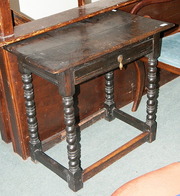 Appraisal: th Century oak side tablefitted one drawer on turned supports