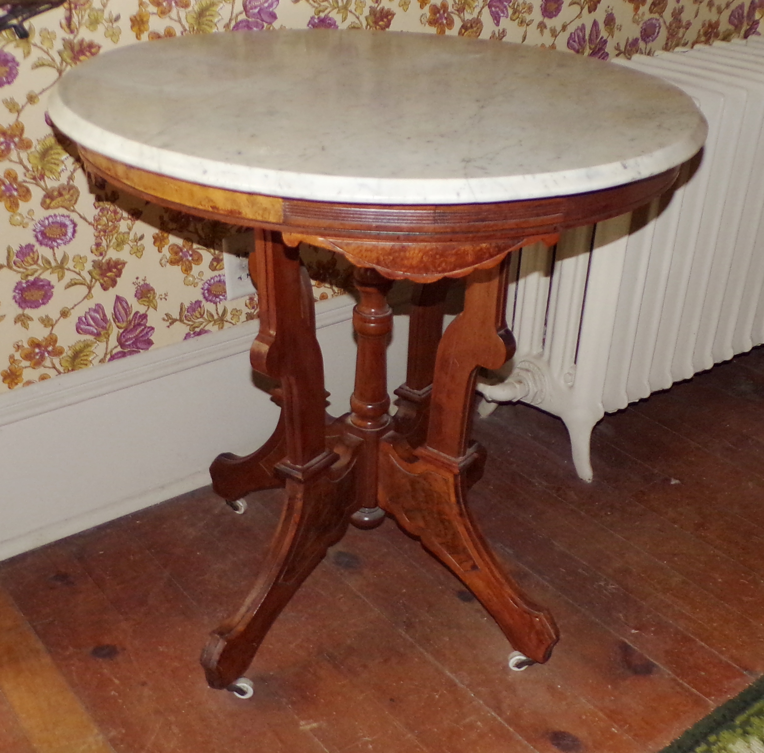 Appraisal: Victorian walnut and burled walnut marble top round occasional table