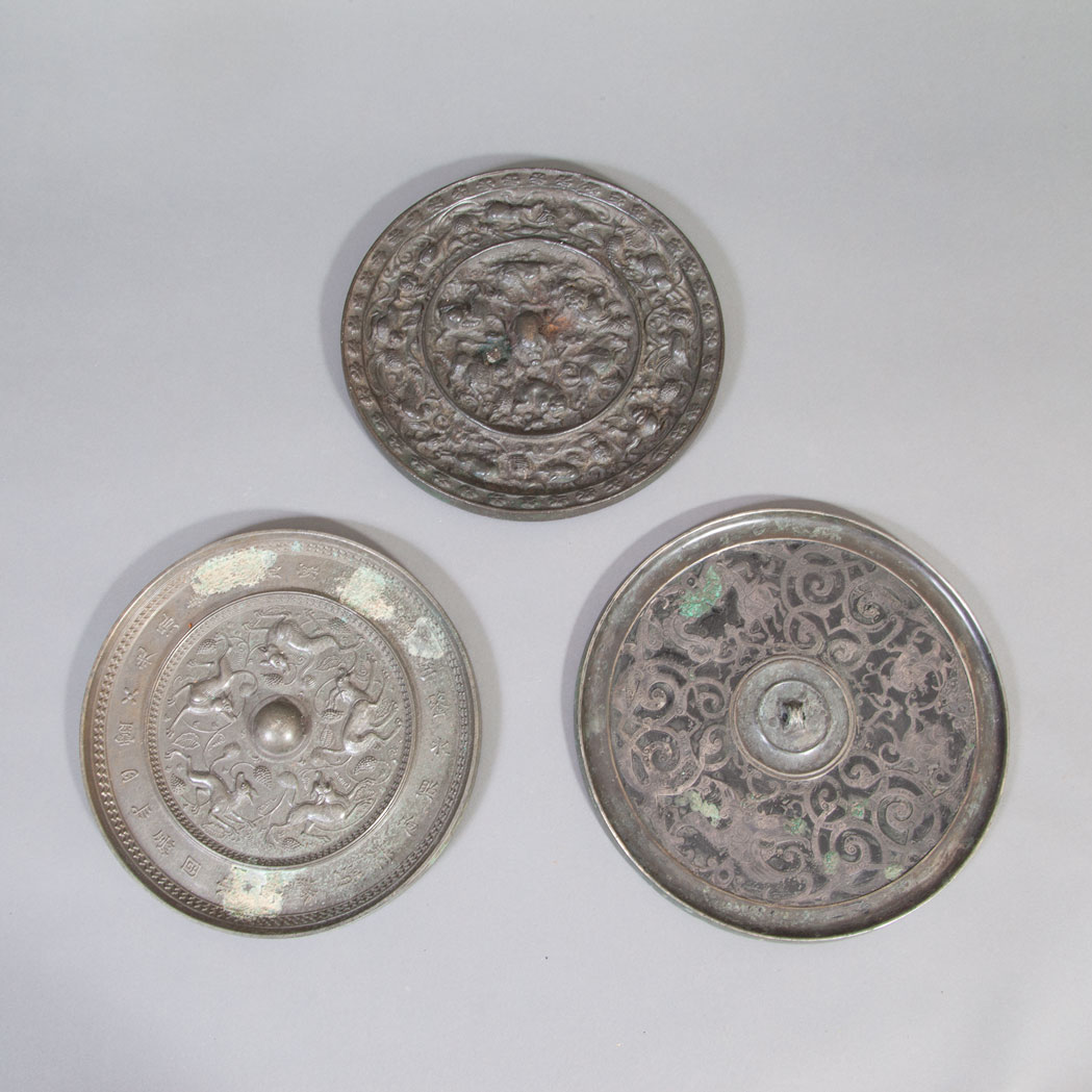 Appraisal: Group of Three Chinese Bronze Mirrors Diameter of largest inches