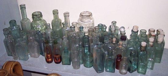 Appraisal: A large collection of small glass bottles including lemonade Horlicks