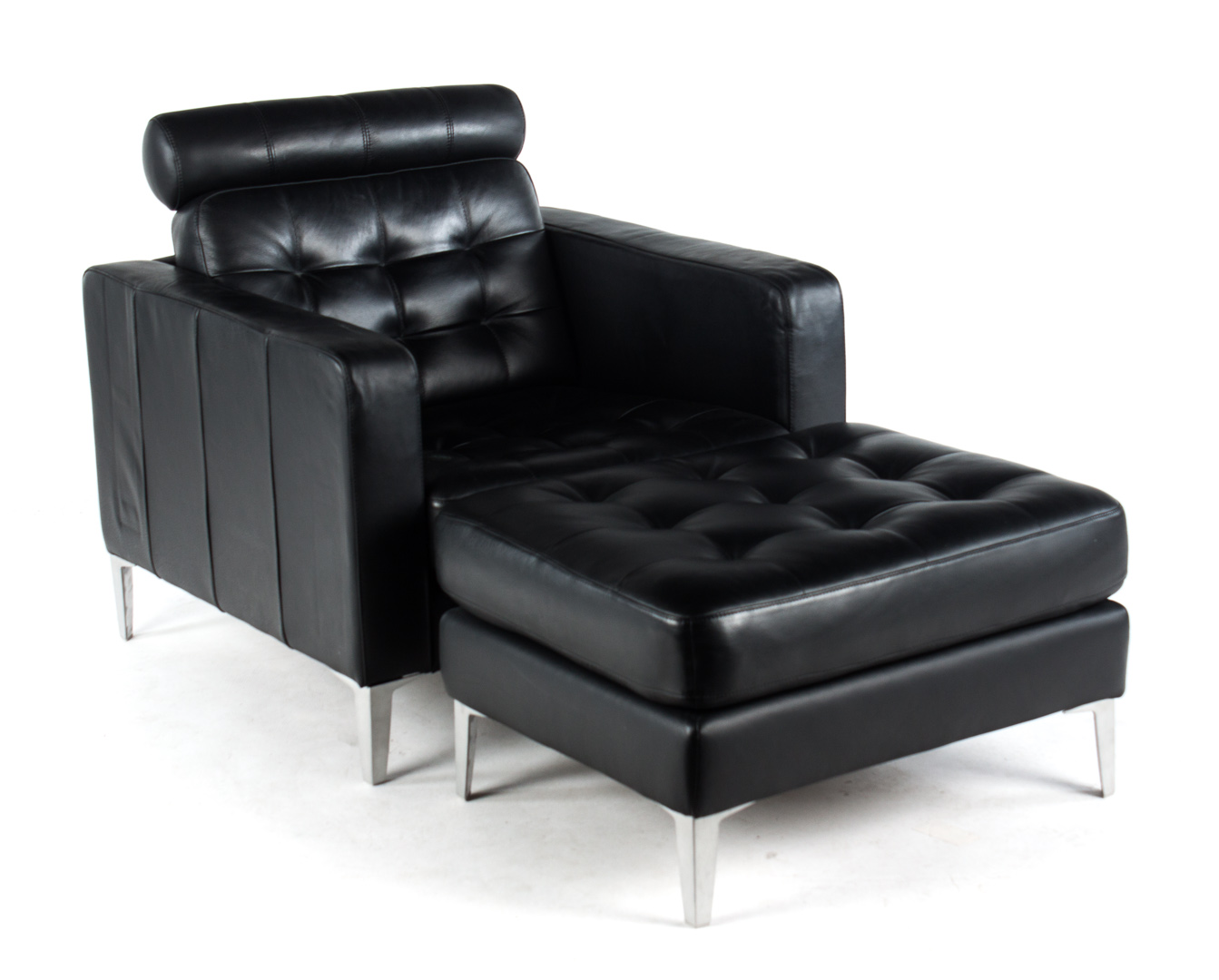 Appraisal: Contemporary black leather armchair foot stool adjustable neck cushion button