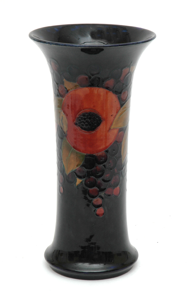 Appraisal: A MOORCROFT POMEGRANATE PATTERN VASE Circa Flared cylindrical with a