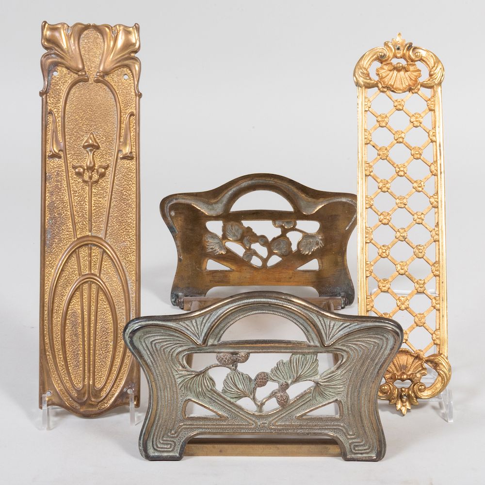 Appraisal: Art Nouveau Brass Bookrest and Two Gilt-Bronze Push Plates The