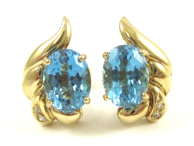 Appraisal: PAIR OF BLUE TOPAZ AND DIAMOND EARRINGS each k yellow