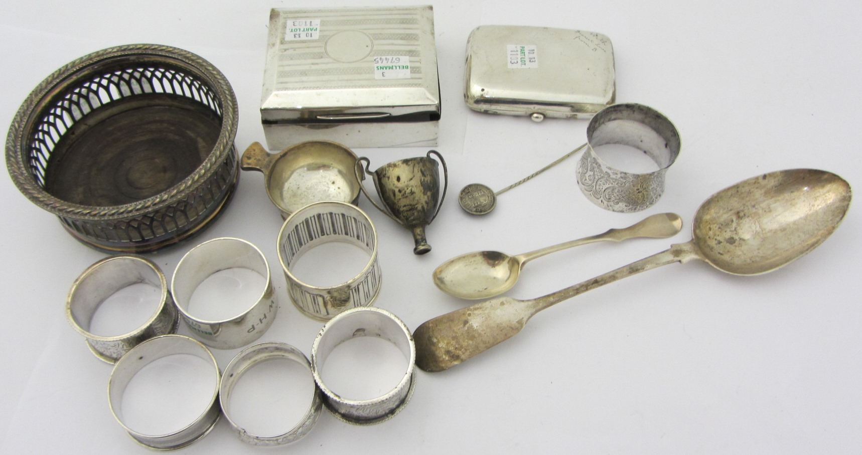 Appraisal: Silver comprising two similar napkin rings with engraved decoration five