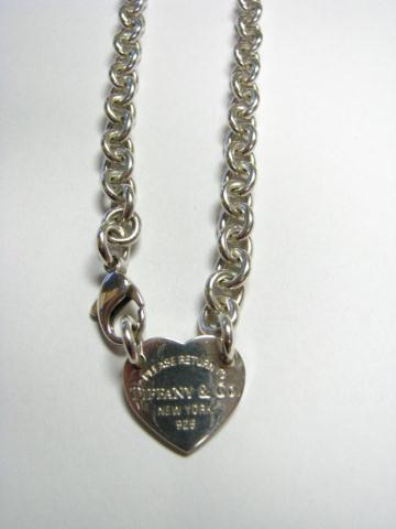 Appraisal: Tiffany sterling silver heart pendant with necklace inscribed Please Return