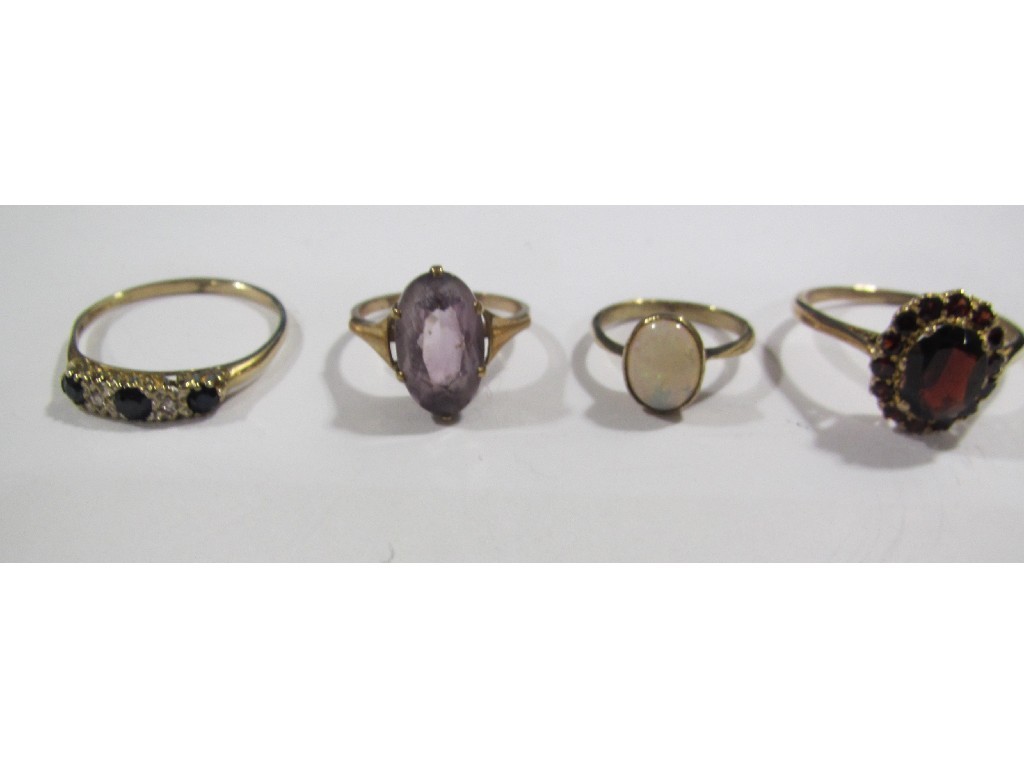 Appraisal: Four ct gold dress rings to include opal single stone