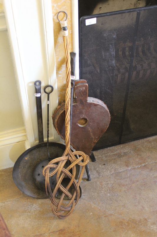 Appraisal: A wrought iron spark guard and other metalware including a