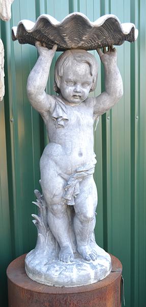 Appraisal: A LEAD FIGURE OF A CUPID ON AN IRON BASEthe