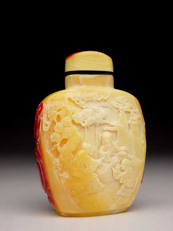 Appraisal: HORNBILL SNUFF BOTTLE Well carved hornbill snuff bottle the front