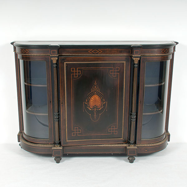 Appraisal: Late th century Victorian ebonized parlor cabinet with veneer Corinthian