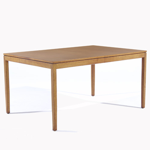 Appraisal: FLORENCE KNOLL KNOLL Walnut dining table with three leaves Knoll