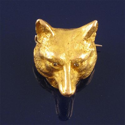 Appraisal: A gold fox mask brooch Realistically formed with textured hair