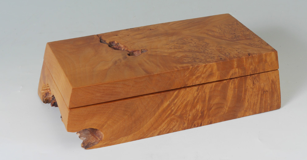 Appraisal: MICHAEL ELKAN BURL BIRDSEYE MAPLE DESK BOX Carved with natural