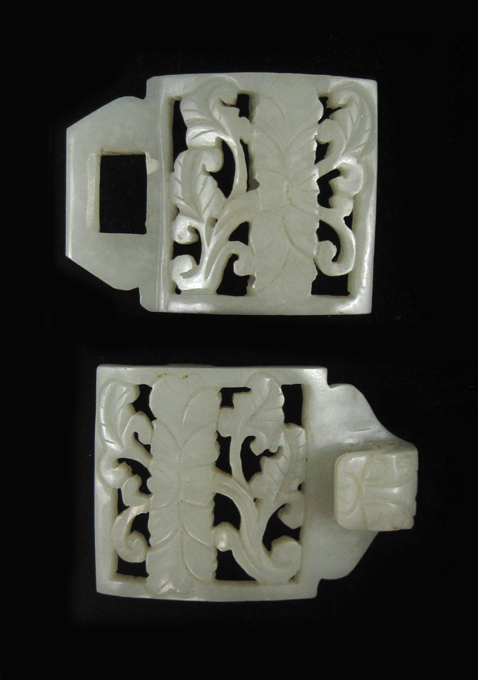 Appraisal: CHINESE JADE BUCKLE two pieces with carved and pierced motif