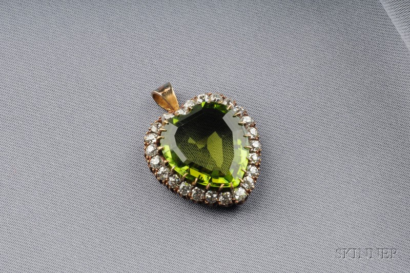 Appraisal: Peridot and Diamond Heart Pendant set with a heart shape