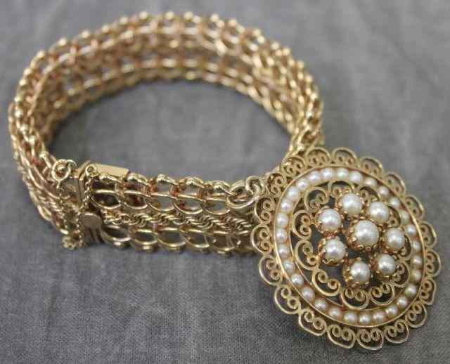 Appraisal: Kt Yellow Gold Bracelet with Charm Large charm with pearls