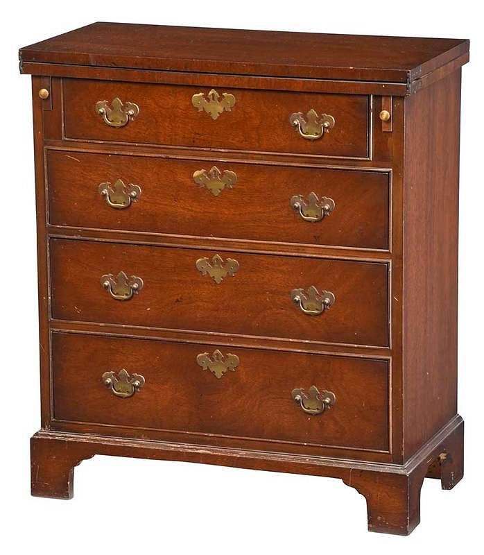 Appraisal: Georgian Style Diminutive Bachelors Chest th century mahogany with fold