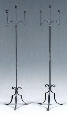 Appraisal: Pair wrought iron torcheres three stepped sockets above twisted shafts