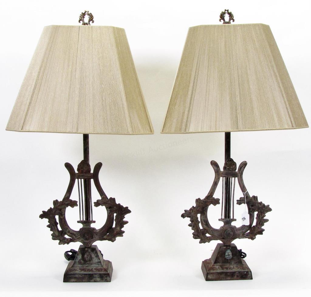 Appraisal: A pair of French style cast metal table lamps with