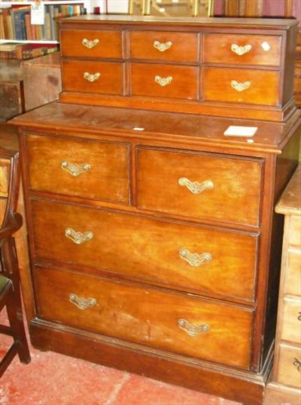 Appraisal: A walnut chest of two short and two long drawers