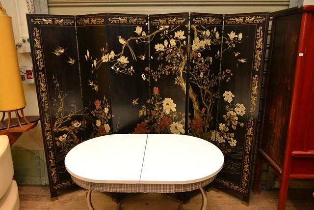 Appraisal: A BLACK LACQUERED SIX PANEL ORIENTAL SCREEN A BLACK LACQUERED