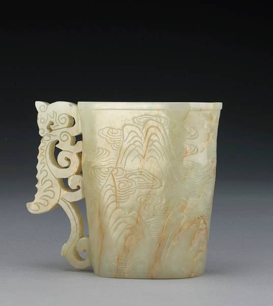 Appraisal: A white nephrite libation cup Of ovoid section with slightly