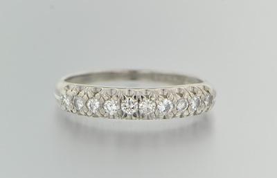 Appraisal: A Platinum and Diamond Ring Platinum mounting set across the