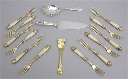 Appraisal: TWELVE FRENCH MONOGRAMMED SILVER-GILT LUNCH FORKS WITH IVORY HANDLES In