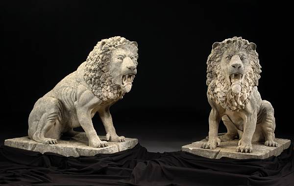 Appraisal: A monumental pair of Italian carved stone figures of seated